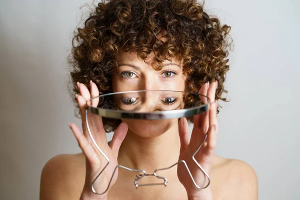 Attractive Young Curly Haired Female Model Holding Mirror Hands Reflection — Stock Photo, Image