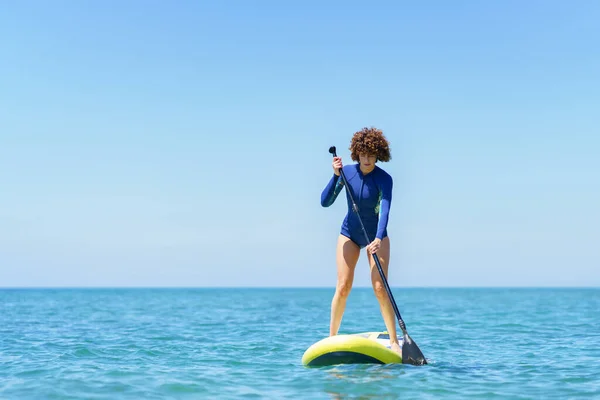 Careful Female Surfer Wetsuit Standing Sup Board Paddling Blue Sea — Stock Photo, Image