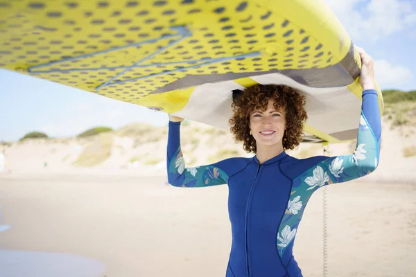 Positive Curly Haired Female Wetsuit Carrying Sup Board Head Smiling — Stock Photo, Image