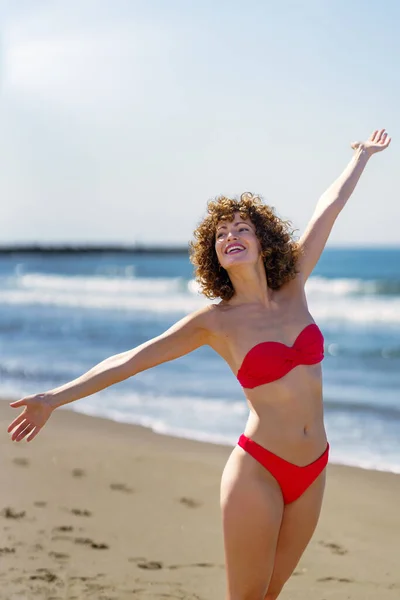 Cheerful Young Female Curly Ginger Hair Bikini Standing Sandy Beach — Stock Photo, Image