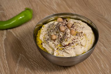 Hummus, also spelled Houmous or Hommus a Jordanian or Israeli Chickpea Dip or Spread