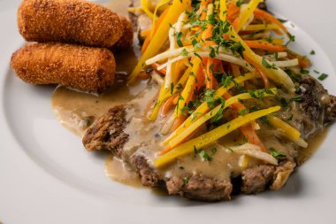 Esterhazy Roast Beef or Rostbraten with Root Vegetable Julienne, Croquettes and Sour Cream Gravy