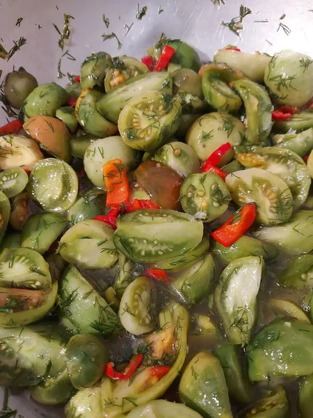 Pickled Green Tomatoes with Red Chili and Dill. High quality photo