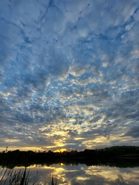 Amazing cloudscape on the sky at sunset time after rain. High quality photo