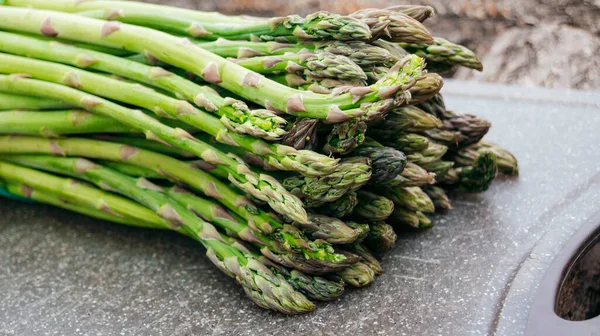 Asparagus. Fresh asparagus. Bunch of green asparagus close-up.