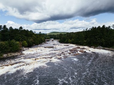 Cascades and waterfalls park on the Ouareau River, in Rawdon, Quebec, Canada. clipart