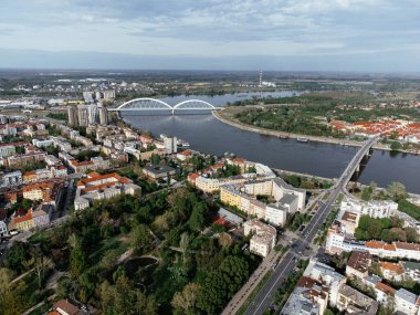 Aerial panorama of Novi Sad with Danube river, bridge and city skyline in Serbia. g.