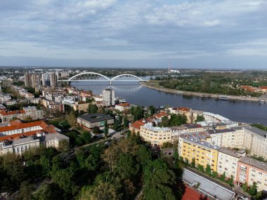 Aerial panorama of Novi Sad with Danube river, bridge and city skyline in Serbia. g.