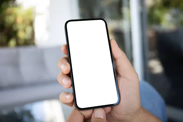 Male hands holding phone with screen isolated in the office