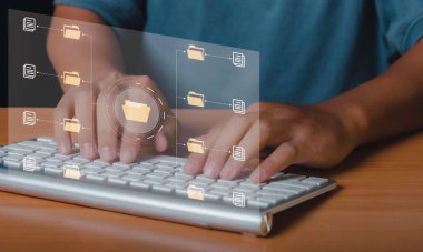 Document Management System (DMS), Businessman access business connection online documentation database and process automation to efficiently manage files. Corporate business technology.