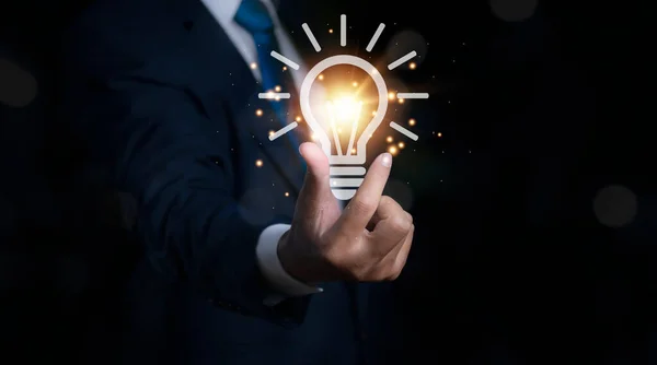 Creative idea and innovation. Businessman with light bulbs icon the idea from online technology. Business, Development, Creative idea, Innovation concept.
