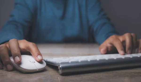 stock image Businessman typing on computer keyboard. Man hand working at office table of keyboard computer. Concept of using technology in communication. Copy space.