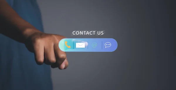 Contact us or Customer support hotline people connect. Man touching contact access connect online with virtual screen contact icons. Customer service call center concept. copy space.