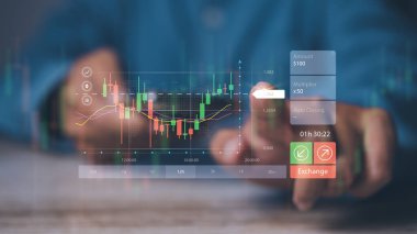 İş adamı ön bilgi ticareti yapıyor. Hedefteki başarı stratejisi hedefi ve planı. Borsa, mali grafik büyüme raporu, iş geliştirme.