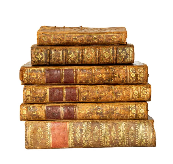 stock image Pile of antique books with a leather cover and golden ornaments on isolated on white background