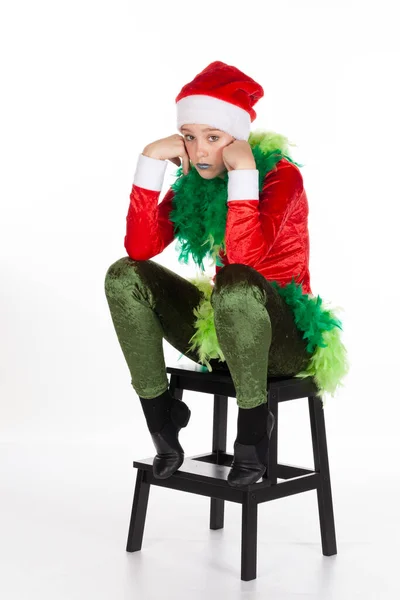 Sitting Young Girl Wearing Red Santa Clause Hat Grinch Hands — Stock Photo, Image