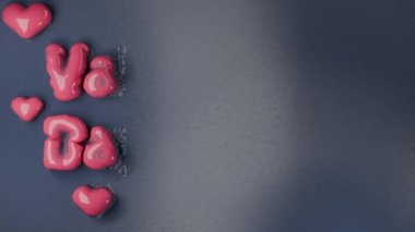 Kalplerin ve Sevgililer Günü 'nün mesajlarının şişip ortaya çıktığı gri bir yüzey. Sevgililer Günü için güzel bir geçmiş.