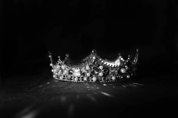 Vintage luxury rich crown with gemstones. Black and white