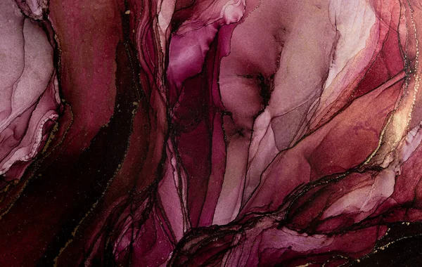 Luxury abstract background in alcohol ink technique pink gold liquid painting