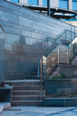 Steps, contemporary granite stone stairs. Architectural details, exterior.	