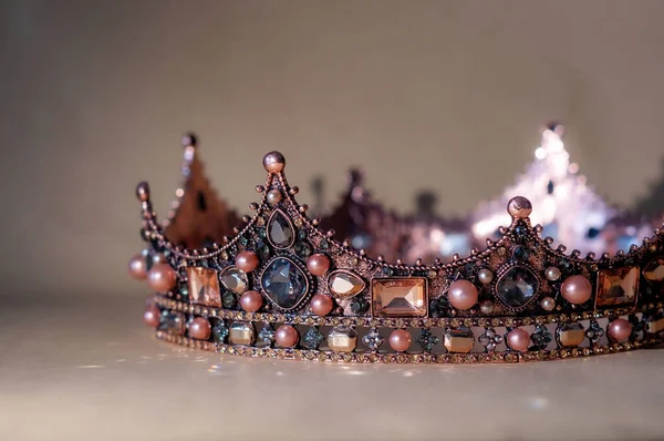 Vintage royal crown with gemstone, rich treasure, authority. King and queen
