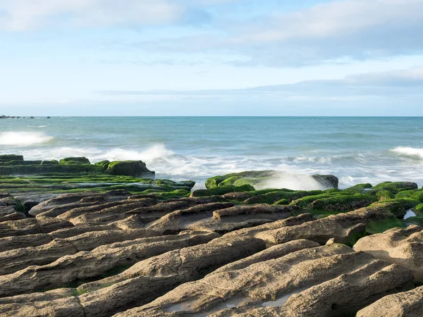 stock image LaoMei green rock troughs /The green Reef in cloudy in New Taipei City,Taiwan.