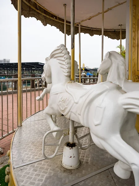 Childhood memories: white carousel horse.