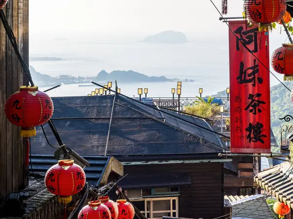 stock image NEW TAIPEI TAIWAN - August 27 ,2024 :Jiufen old street with tourists walking and shopping. Traditional chinese lanterns hanging along the narrow street.It is a popular travel destination near Taipei.