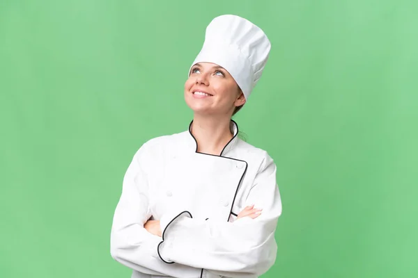 Joven Chef Mujer Sobre Aislado Verde Fondo —  Fotos de Stock