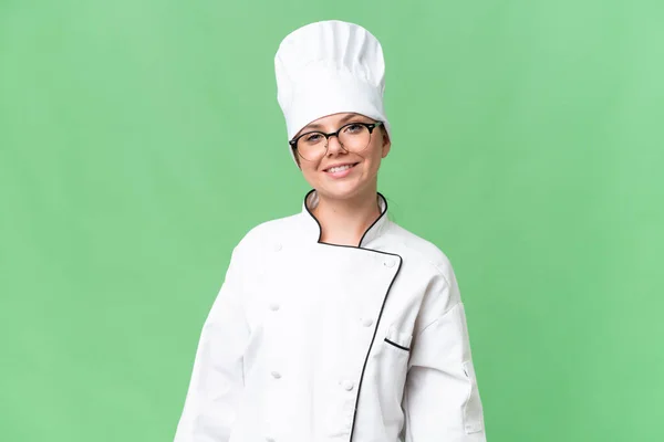 Jovem Chef Mulher Sobre Isolado Fundo Verde — Fotografia de Stock