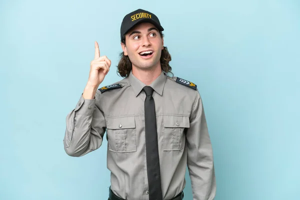 Young Safeguard Man Isolated Blue Background Intending Realizes Solution While — Stock Photo, Image