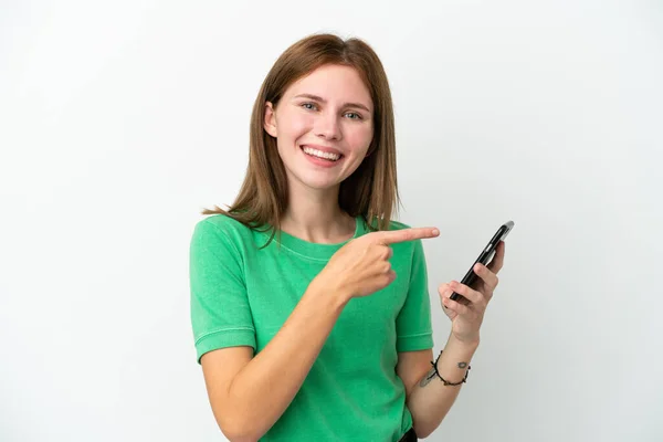 Молода Англійська Жінка Ізольована Білому Тлі Користується Мобільним Телефоном Вказує — стокове фото