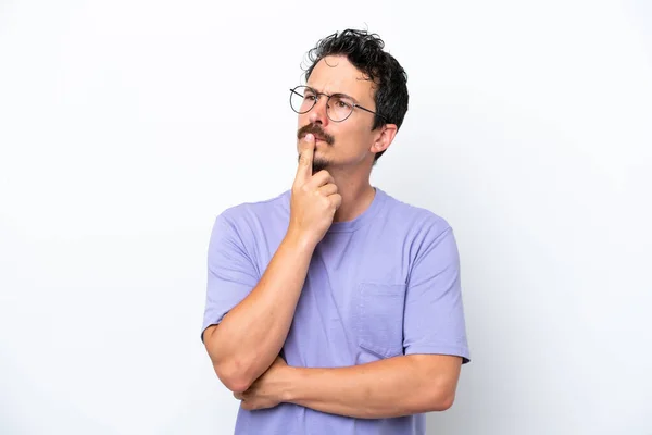 Young Man Moustache Isolated White Background Having Doubts While Looking — Foto de Stock