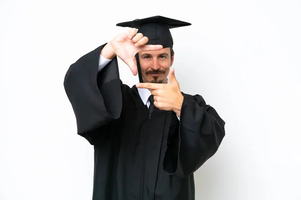 stock image Young university graduate man isolated on white background focusing face. Framing symbol