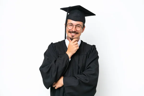 Jonge Afgestudeerde Man Geïsoleerd Witte Achtergrond Met Bril Glimlach — Stockfoto
