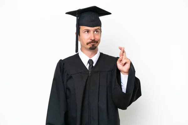 Junger Universitätsabsolvent Isoliert Auf Weißem Hintergrund Mit Daumendrücken Und Guten — Stockfoto