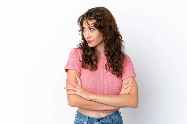 Young Woman Curly Hair Isolated White Background Looking Side — Φωτογραφία Αρχείου