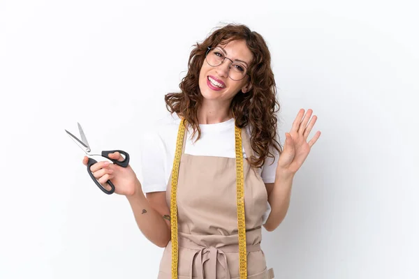 Young Caucasian Seamstress Woman Isolated White Background Saluting Hand Happy — 스톡 사진