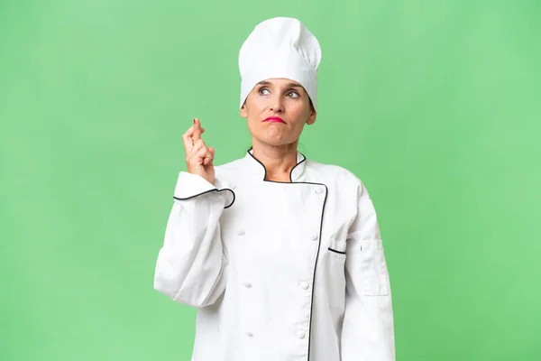 Chef Donna Mezza Età Sfondo Isolato Con Dita Incrociate Augurando — Foto Stock