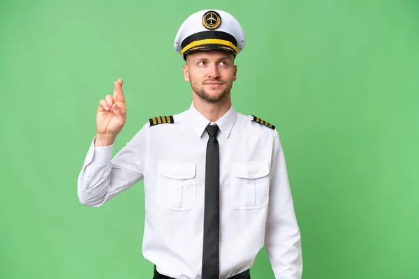 Flugzeugpilot Mann Über Isoliertem Hintergrund Mit Daumendrücken Und Guten Wünschen — Stockfoto