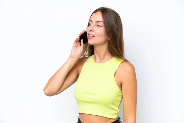 Beyaz Arka Planda Izole Edilmiş Genç Beyaz Kadın Cep Telefonuyla — Stok fotoğraf