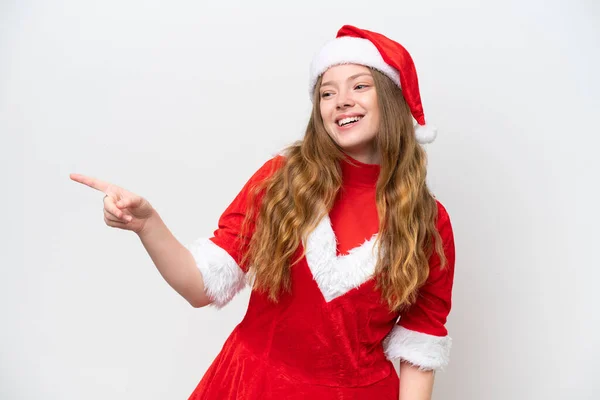 Молода Жінка Різдвяним Одягом Ізольована Білому Фоні Вказує Пальцем Бік — стокове фото