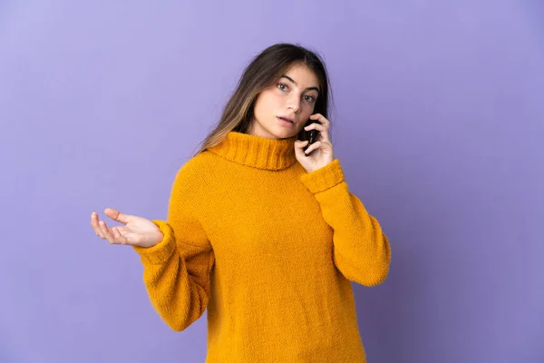 Young Caucasian Woman Isolated Purple Background Keeping Conversation Mobile Phone — Stock Photo, Image