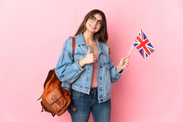 Young Woman Holding United Kingdom Flag Isolated Pink Background Giving — Stock fotografie