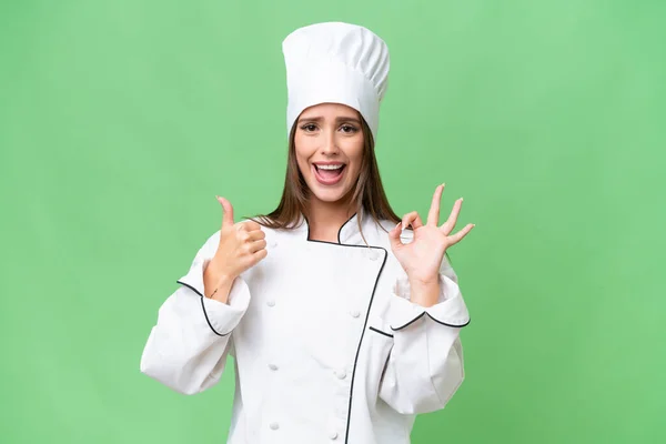 Giovane Donna Caucasica Chef Sfondo Isolato Mostrando Segno Pollice Gesto — Foto Stock