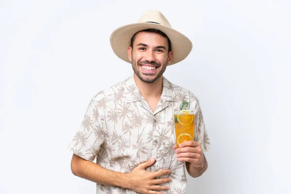 Young Caucasian Man Holding Cocktail Isolated White Background Smiling Lot — Stock Photo, Image