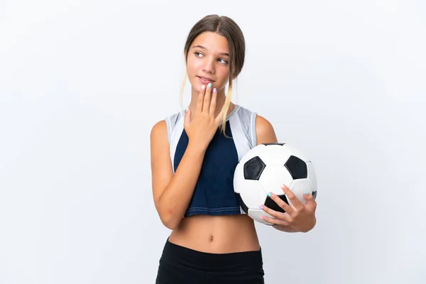 Pequena Menina Caucasiana Jogando Futebol Isolado Fundo Branco Olhando Para — Fotografia de Stock