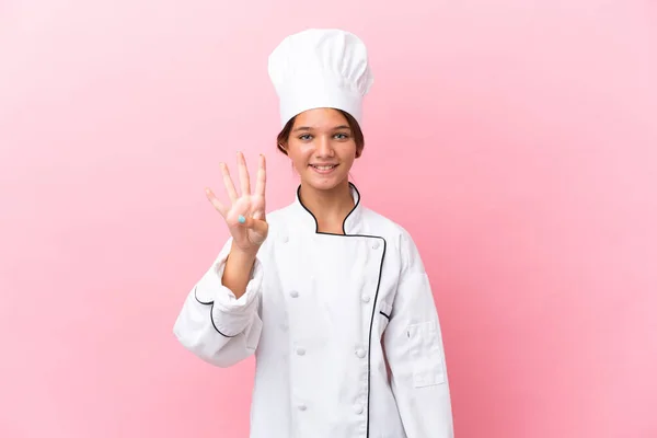 Pouco Branco Chef Menina Isolado Fundo Rosa Feliz Contando Quatro — Fotografia de Stock