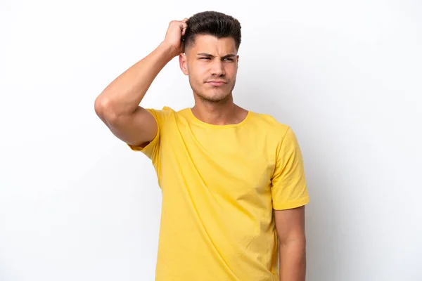 Young Caucasian Man Isolated White Background Having Doubts While Scratching — Stock Fotó