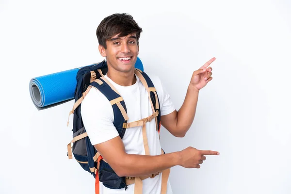 Young Mountaineer Woman Big Backpack Isolated White Background Pointing Finger — Φωτογραφία Αρχείου